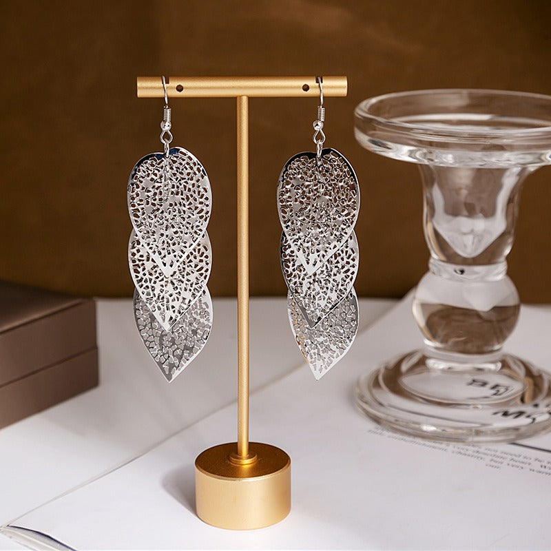 Ceres II Leaf Earrings - Large stylized  leaf earrings available in gold or silver colours. 