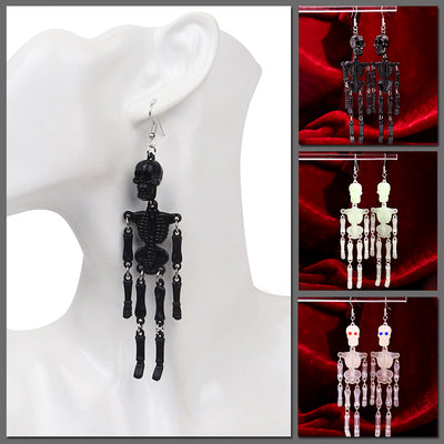 Charon Dancing Skeleton Earrings - Large acrylic resin skeleton earrings suspended from a basic french hook.