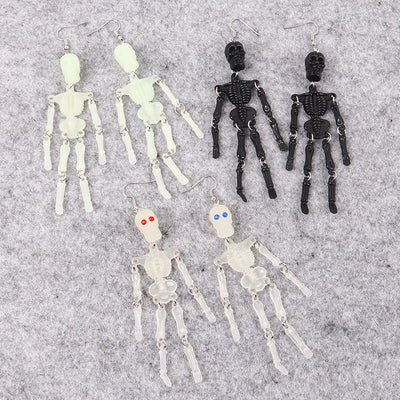 Charon Dancing Skeleton Earrings - Large acrylic resin skeleton earrings suspended from a basic french hook.