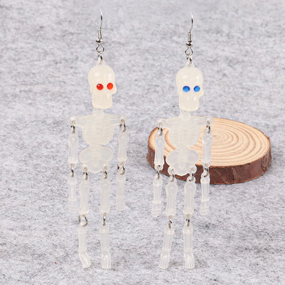 Charon Dancing Skeleton Earrings - Large acrylic resin skeleton earrings suspended from a basic french hook.