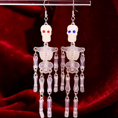 Charon Dancing Skeleton Earrings - Large acrylic resin skeleton earrings suspended from a basic french hook.