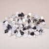Cheeky Crafter Brooch Pins & Backs Kit - A box of 48 pin-style brooch backs and matching caps, shown in various uses.