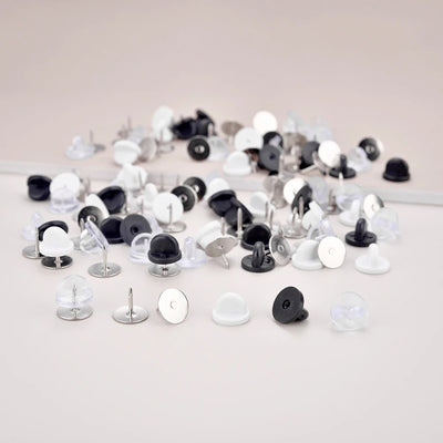 Cheeky Crafter Brooch Pins & Backs Kit - A box of 48 pin-style brooch backs and matching caps, shown in various uses.