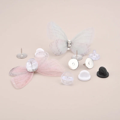 Cheeky Crafter Brooch Pins & Backs Kit - A box of 48 pin-style brooch backs and matching caps, shown in various uses.