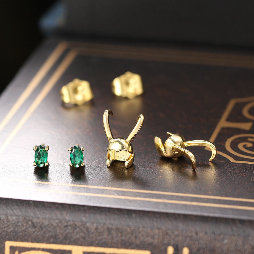 Cheeky Geek Trickster Transforming Stud Earrings - Teeny tiny green stud earrings, with a removable horned helmet to make them look like a miniature, stylised tribute to Loki, God of Mischief.