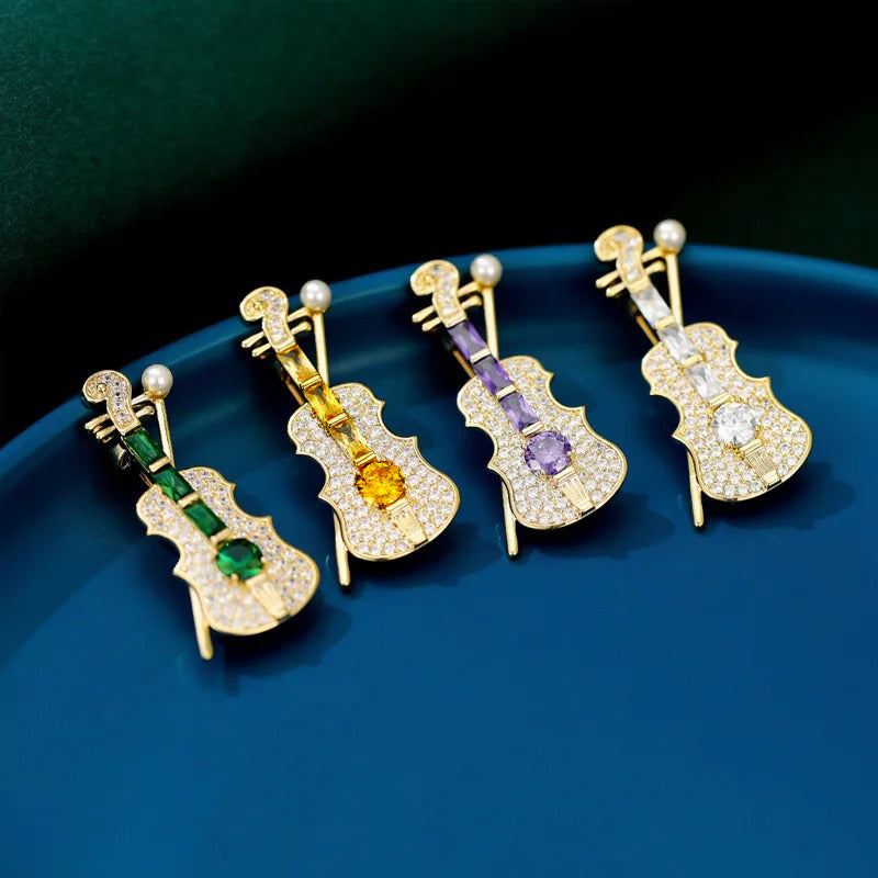 Claudia Crystal Violin Brooch - A medium-sized brooch shaped like a stylised violin, encrusted with tiny cubic zirconia crystals.