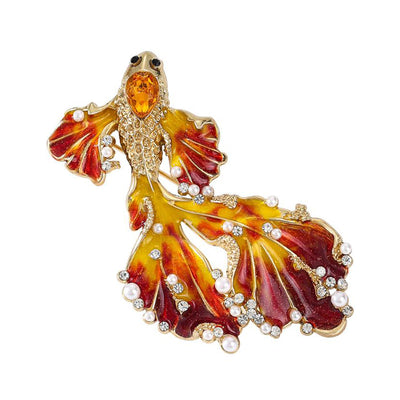 Cleo Double Tail Betta Fish Brooch - Three elegant stylised fish brooches adorned with tiny crystals and pearls, available in blue, orange, or purple colour palettes.