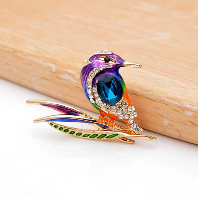 Cute Critters Brooch - Kingfisher - An adorable rainbow-coloured crystal and enamel brooch shaped like a bird sitting on a branch.