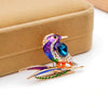 Cute Critters Brooch - Kingfisher - An adorable rainbow-coloured crystal and enamel brooch shaped like a bird sitting on a branch.