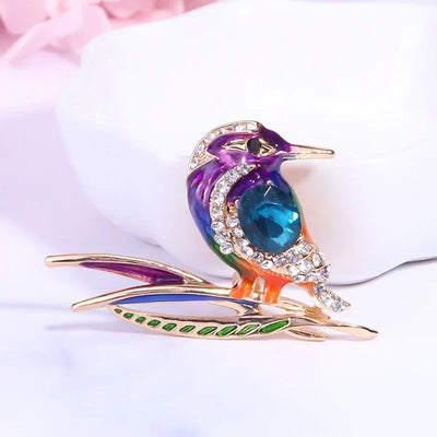 Cute Critters Brooch - Kingfisher - An adorable rainbow-coloured crystal and enamel brooch shaped like a bird sitting on a branch.