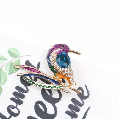 Cute Critters Brooch - Kingfisher - An adorable rainbow-coloured crystal and enamel brooch shaped like a bird sitting on a branch.