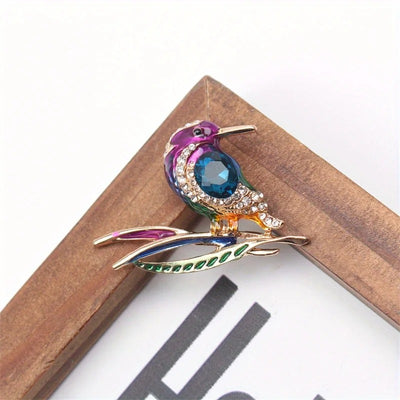 Cute Critters Brooch - Kingfisher - An adorable rainbow-coloured crystal and enamel brooch shaped like a bird sitting on a branch.