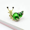 Cute Critters Brooch - Snail - An adorable snail brooch in blue, green, peach, red, silver, or orange.
