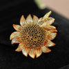 Cute Critters Brooch - Bumblebloom Deluxe - A small round sunflower brooch with a little golden bee attached by a tiny spring.