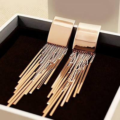Dakari Tassel Earrings - Long stylish statement dangle earrings, featuring a solid rectangle over the lobe, with assorted long tassels strung off it.