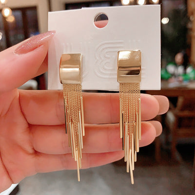 Dakari Tassel Earrings - Long stylish statement dangle earrings, featuring a solid rectangle over the lobe, with assorted long tassels strung off it.