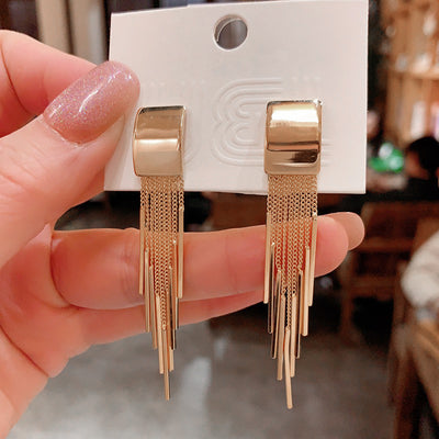 Dakari Tassel Earrings - Long stylish statement dangle earrings, featuring a solid rectangle over the lobe, with assorted long tassels strung off it.