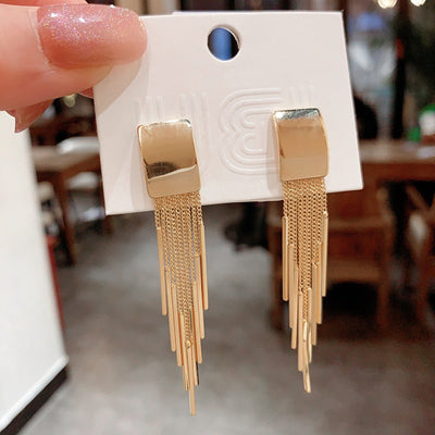 Dakari Tassel Earrings - Long stylish statement dangle earrings, featuring a solid rectangle over the lobe, with assorted long tassels strung off it.