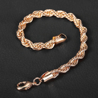 Damodice Spiral Chain Bracelet - A beautiful rose gold spiral chain bracelet that looks like it's made out of twisted strands of gold.