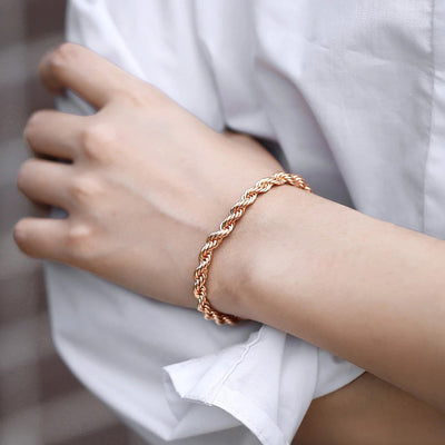 Damodice Spiral Chain Bracelet - A beautiful rose gold spiral chain bracelet that looks like it's made out of twisted strands of gold.