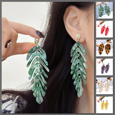 Daphne Acrylic Fern Frond Dangle Earrings - Large resin earrings made to resemble the fronds of a fern, formed from marbled acrylic in various shades of green, red, cream, yellow, and purple.