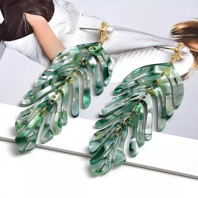 Daphne Acrylic Fern Frond Dangle Earrings - Large resin earrings made to resemble the fronds of a fern, formed from marbled acrylic in various shades of green, red, cream, yellow, and purple.