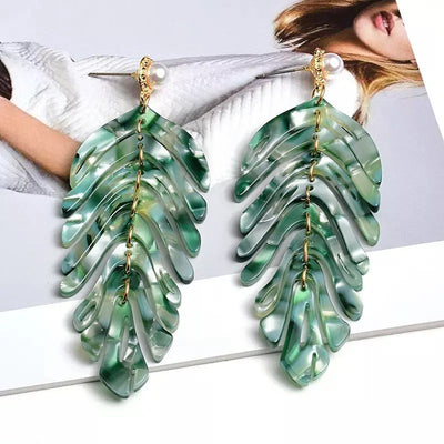 Daphne Acrylic Fern Frond Dangle Earrings - Large resin earrings made to resemble the fronds of a fern, formed from marbled acrylic in various shades of green, red, cream, yellow, and purple.