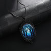 Dark Forest Cameo Necklace - A large gothic glass cabochon featuring an image of dark, spooky trees against a dark blue night sky background.