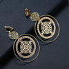 Devani Filigree Disc Clip Earrings - Metal clip-on earrings made from a series of interlocking metal circles, with an embossed filigree pattern.