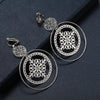 Devani Filigree Disc Clip Earrings - Metal clip-on earrings made from a series of interlocking metal circles, with an embossed filigree pattern.