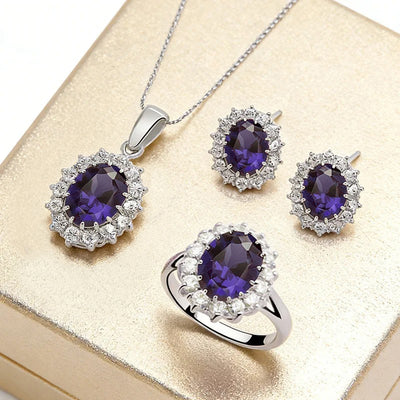 Diana II Luxury Crystal Jewellery Set - A beautiful large crystal surrounded by smaller white crystals. The central stone is available in bright blue, dark blue, green, purple, or red.