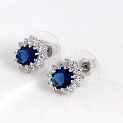 Diana II Luxury Crystal Jewellery Set - A beautiful large crystal surrounded by smaller white crystals. The central stone is available in bright blue, dark blue, green, purple, or red.