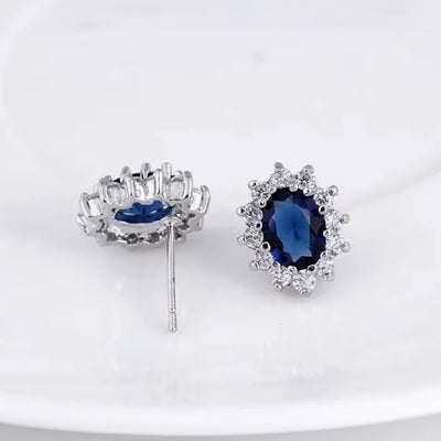 Diana II Luxury Crystal Jewellery Set - A beautiful large crystal surrounded by smaller white crystals. The central stone is available in bright blue, dark blue, green, purple, or red.