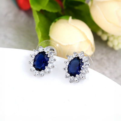 Diana II Luxury Crystal Jewellery Set - A beautiful large crystal surrounded by smaller white crystals. The central stone is available in bright blue, dark blue, green, purple, or red.