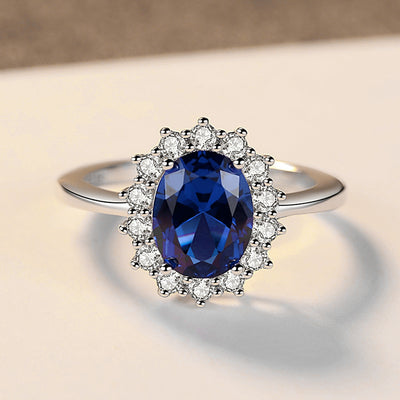 Diana II Luxury Crystal Jewellery Set - A beautiful large crystal surrounded by smaller white crystals. The central stone is available in bright blue, dark blue, green, purple, or red.