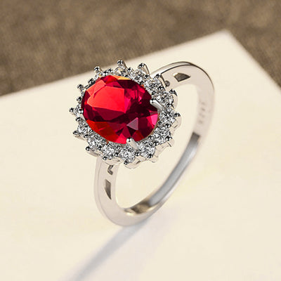 Diana II Luxury Crystal Jewellery Set - A beautiful large crystal surrounded by smaller white crystals. The central stone is available in bright blue, dark blue, green, purple, or red.