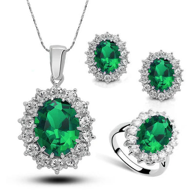 Diana II Luxury Crystal Jewellery Set - A beautiful large crystal surrounded by smaller white crystals. The central stone is available in bright blue, dark blue, green, purple, or red.