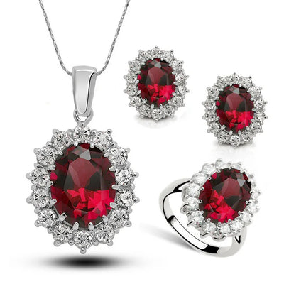 Diana II Luxury Crystal Jewellery Set - A beautiful large crystal surrounded by smaller white crystals. The central stone is available in bright blue, dark blue, green, purple, or red.