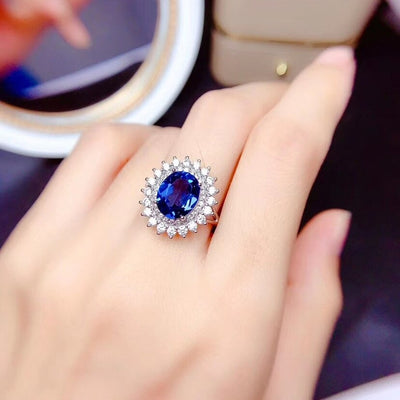 Diana Luxury Crystal Pendant & Ring Set - A beautiful large dark blue crystal nestled amongst approximately 40 smaller white quartz stones.
