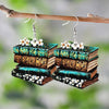 The Eleanor Stacked Books Wooden Earrings - Cute flat wooden earrings painted with a stack of books and some delicate flowers on one side.