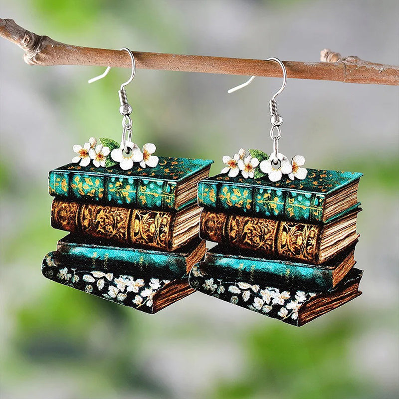 The Eleanor Stacked Books Wooden Earrings - Cute flat wooden earrings painted with a stack of books and some delicate flowers on one side.