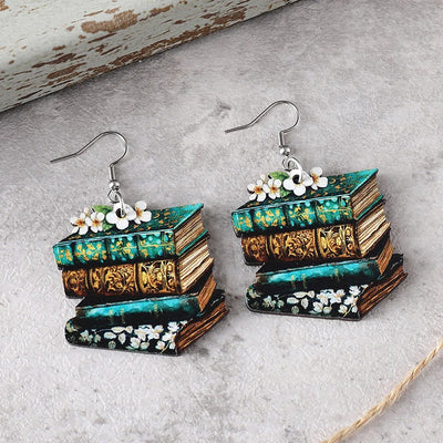 The Eleanor Stacked Books Wooden Earrings - Cute flat wooden earrings painted with a stack of books and some delicate flowers on one side.