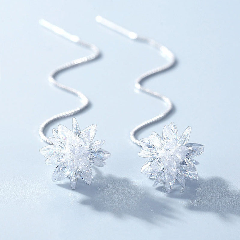 Elsa Crystal Drop Threader Earrings - A sparkling snowflake-style charm suspended on a long silver threader earring. 