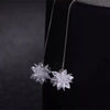 Elsa Crystal Drop Threader Earrings - A sparkling snowflake-style charm suspended on a long silver threader earring.