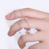 Elsa Crystal Drop Threader Earrings - A sparkling snowflake-style charm suspended on a long silver threader earring.