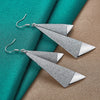 Emilie Geometric Drop Earrings - A pair of beautiful silver earrings made from a pair of cleverly-shaped and textured triangles that fall together to resemble the folds of fabric