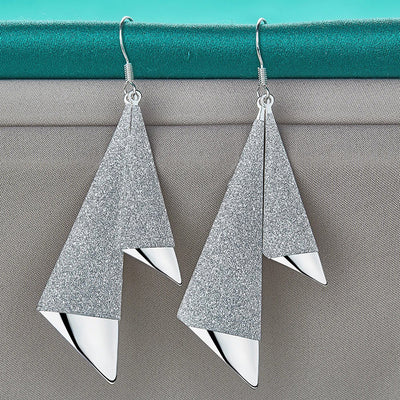 Emilie Geometric Drop Earrings - A pair of beautiful silver earrings made from a pair of cleverly-shaped and textured triangles that fall together to resemble the folds of fabric