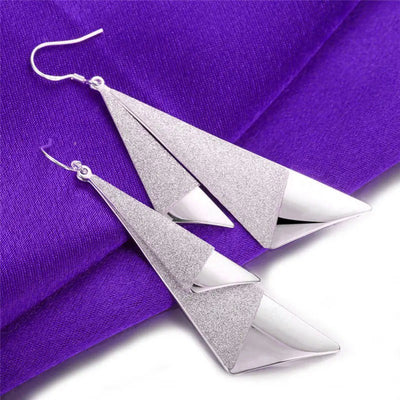 Emilie Geometric Drop Earrings - A pair of beautiful silver earrings made from a pair of cleverly-shaped and textured triangles that fall together to resemble the folds of fabric