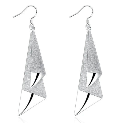 Emilie Geometric Drop Earrings - A pair of beautiful silver earrings made from a pair of cleverly-shaped and textured triangles that fall together to resemble the folds of fabric