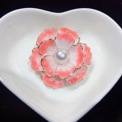 Emma II Ruffled Peony Enamel Brooch - A round, elegant brooch featuring an array of ruffled petals clustered around a small round pearl.